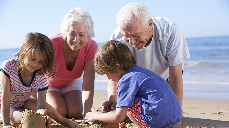 Family Grandparent Holiday Beach Istock 157739271